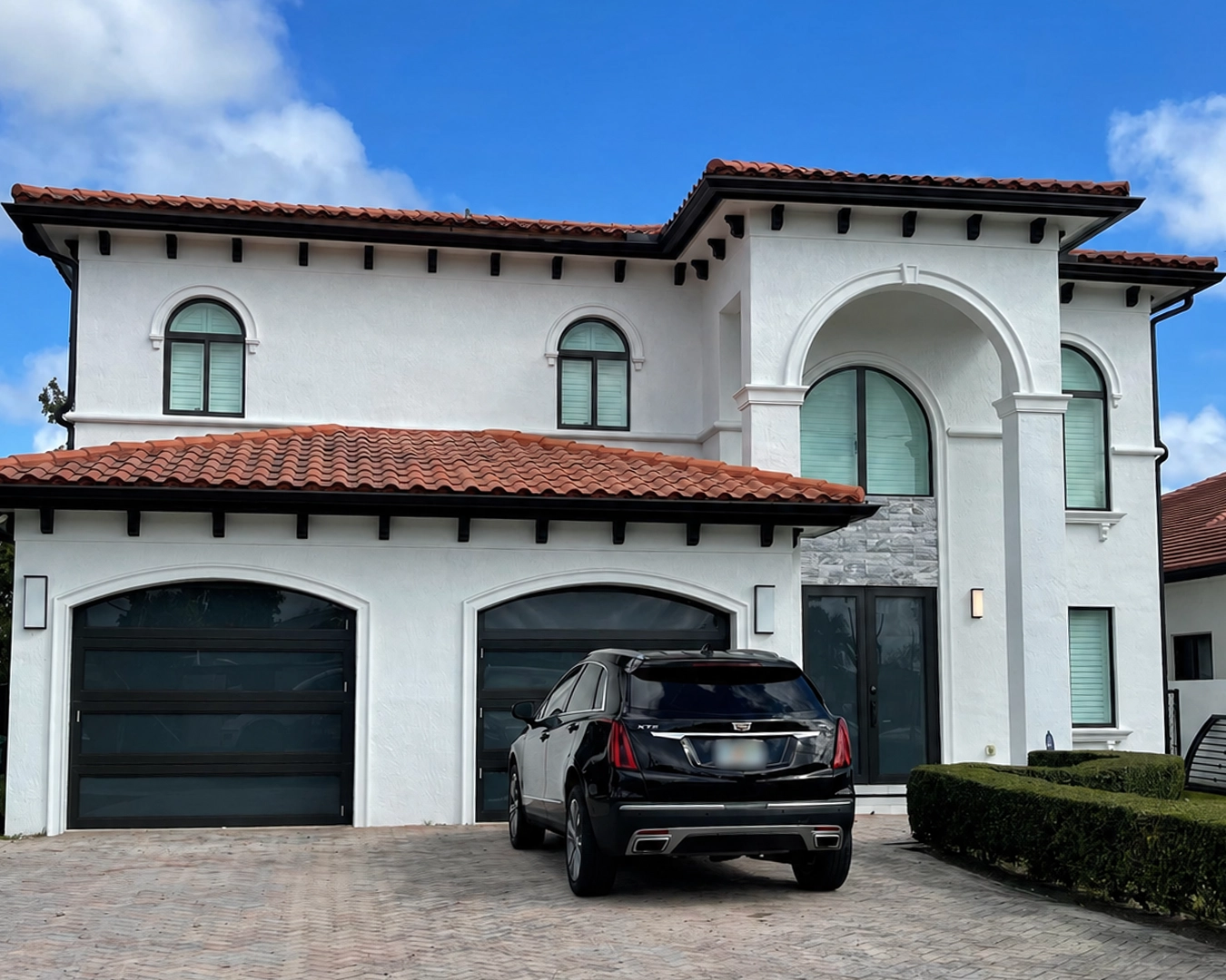 Impact glass doors connecting an Aventura residence with its pool deck