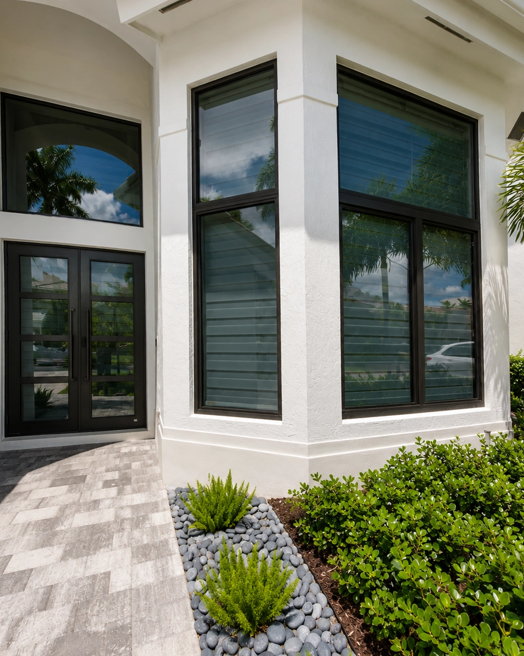 White-frame impact windows installed on a residence in Cutler Bay